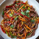 Fresh 30-Minute Stir Fried Korean Beef and Toasted Sesame Noodles. shot
