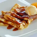 Homemade French Crpes w/ Vanilla Bean Ice Cream and Orange Jelly photo
