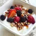 Homemade Greek Yogurt with Berries, Nuts and Honey photo