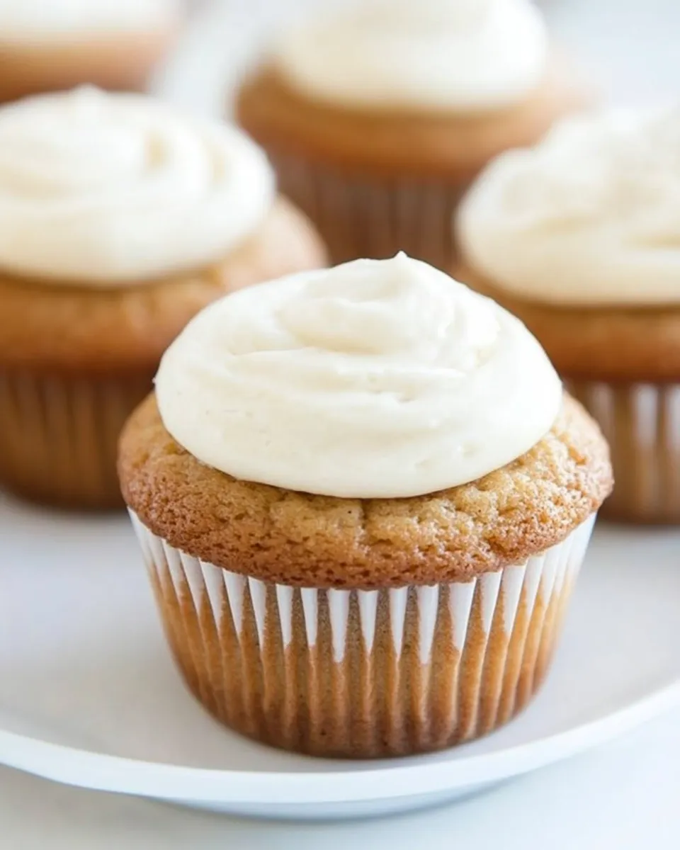 Homemade Honey Cupcakes with Vanilla Frosting photo