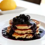 Homemade Lemon Ricotta Pancakes with Blueberry Sauce photo